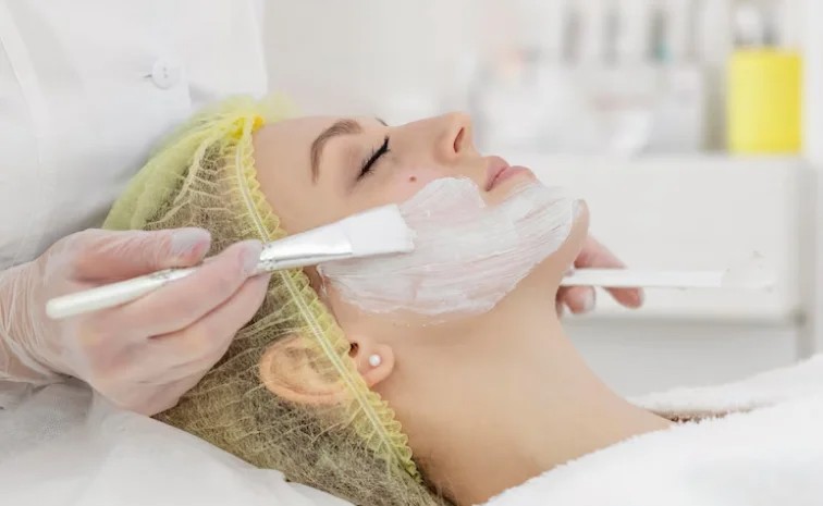 skincare tips - facial mask being applied in the face of the client by Atomic Dermatology and Med Spa