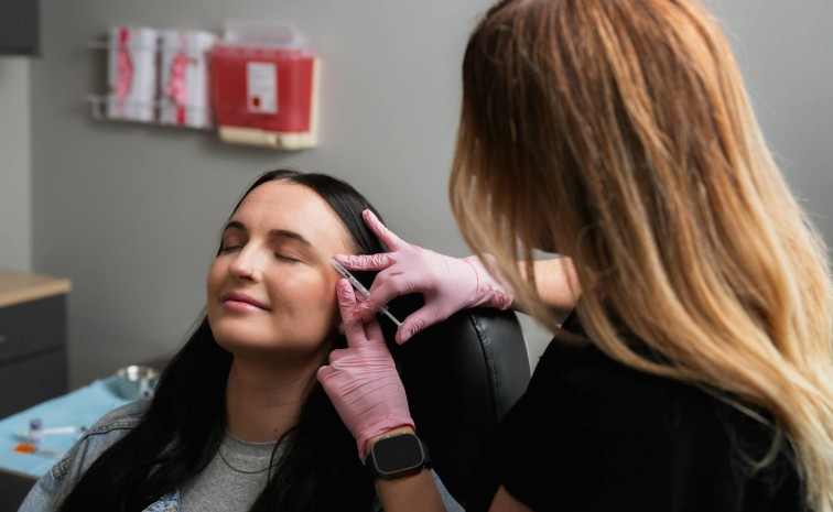 patient having her Botox treatment at Atomic Dermatology and Med Spa