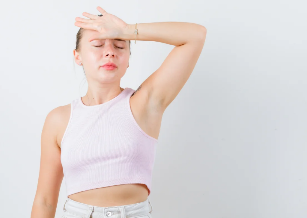 woman showing her underarms Atomic Dermatology and Med Spa